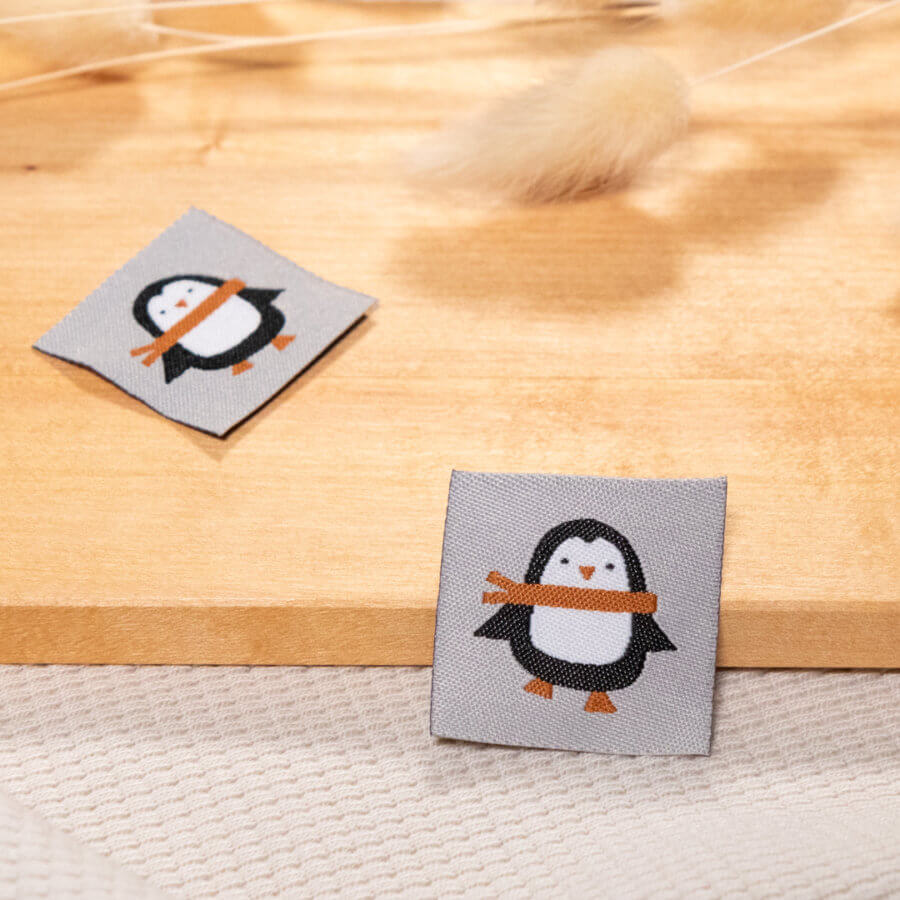 Weblabel Beanie Pinguin Hellgrau